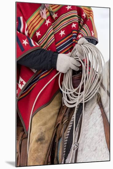 Cowboy detail in the Saddle, Hideout Ranch, Shell, Wyoming.-Darrell Gulin-Mounted Photographic Print