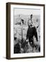 Cowboy Holds His Baby While Riding a Horse-Dorothea Lange-Framed Art Print