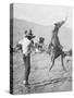 Cowboy Holds Rope around Struggling Bronco's Neck Photograph - Texas-Lantern Press-Stretched Canvas