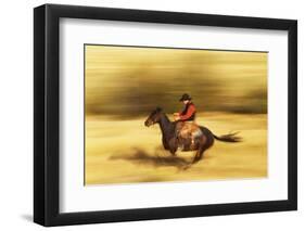Cowboy on Galloping Horse-Darrell Gulin-Framed Photographic Print