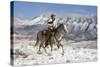 Cowboy On Grey Quarter Horse Trotting In The Snow At Flitner Ranch, Shell, Wyoming-Carol Walker-Stretched Canvas