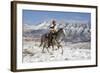 Cowboy On Grey Quarter Horse Trotting In The Snow At Flitner Ranch, Shell, Wyoming-Carol Walker-Framed Photographic Print