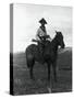 Cowboy on Horseback with Rifle-null-Stretched Canvas