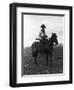 Cowboy on Horseback with Rifle-null-Framed Photographic Print