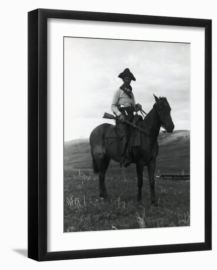 Cowboy on Horseback with Rifle-null-Framed Photographic Print