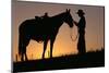 Cowboy Petting Horse at Sunset-Darrell Gulin-Mounted Photographic Print