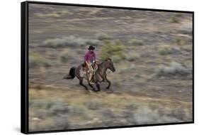 Cowboy Riding at Full Speed in Motion-Terry Eggers-Framed Stretched Canvas