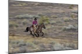 Cowboy Riding at Full Speed in Motion-Terry Eggers-Mounted Photographic Print