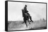 Cowboy riding Bronco in Burns, OR Rodeo Photograph - Burns, OR-Lantern Press-Framed Stretched Canvas