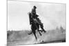 Cowboy riding Bronco in Burns, OR Rodeo Photograph - Burns, OR-Lantern Press-Mounted Premium Giclee Print