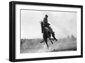 Cowboy riding Bronco in Burns, OR Rodeo Photograph - Burns, OR-Lantern Press-Framed Art Print