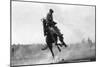 Cowboy riding Bronco in Burns, OR Rodeo Photograph - Burns, OR-Lantern Press-Mounted Art Print