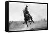 Cowboy riding Bronco in Burns, OR Rodeo Photograph - Burns, OR-Lantern Press-Framed Stretched Canvas