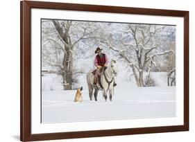 Cowboy riding his horse in winter, Hideout Ranch, Shell, Wyoming.-Darrell Gulin-Framed Photographic Print