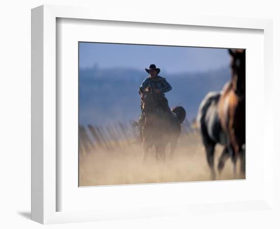 Cowboy Riding Horseback, Oregon, USA-William Sutton-Framed Photographic Print