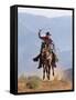 Cowboy Running with Rope Lassoo in Hand, Flitner Ranch, Shell, Wyoming, USA-Carol Walker-Framed Stretched Canvas