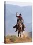 Cowboy Running with Rope Lassoo in Hand, Flitner Ranch, Shell, Wyoming, USA-Carol Walker-Stretched Canvas