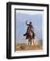 Cowboy Running with Rope Lassoo in Hand, Flitner Ranch, Shell, Wyoming, USA-Carol Walker-Framed Premium Photographic Print