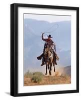 Cowboy Running with Rope Lassoo in Hand, Flitner Ranch, Shell, Wyoming, USA-Carol Walker-Framed Photographic Print