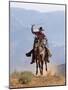 Cowboy Running with Rope Lassoo in Hand, Flitner Ranch, Shell, Wyoming, USA-Carol Walker-Mounted Photographic Print