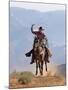 Cowboy Running with Rope Lassoo in Hand, Flitner Ranch, Shell, Wyoming, USA-Carol Walker-Mounted Photographic Print