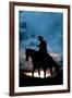 Cowboy Silhouette in Sunset-null-Framed Photo