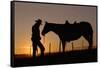 Cowboy Standing with His Horse-Darrell Gulin-Framed Stretched Canvas