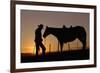 Cowboy Standing with His Horse-Darrell Gulin-Framed Photographic Print