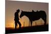 Cowboy Standing with His Horse-Darrell Gulin-Mounted Photographic Print