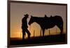 Cowboy Standing with His Horse-Darrell Gulin-Framed Photographic Print