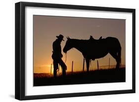 Cowboy Standing with His Horse-Darrell Gulin-Framed Photographic Print