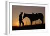 Cowboy Standing with His Horse-Darrell Gulin-Framed Photographic Print