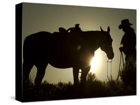 Cowboy With His Horse at Sunset, Ponderosa Ranch, Oregon, USA-Josh Anon-Stretched Canvas