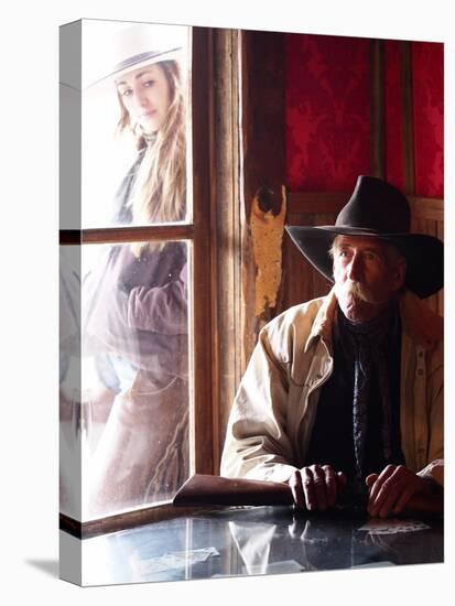 Cowboy with Rifle and Cowgirl Looking over His Shoulder-Terry Eggers-Stretched Canvas