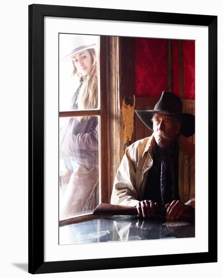 Cowboy with Rifle and Cowgirl Looking over His Shoulder-Terry Eggers-Framed Photographic Print