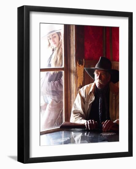 Cowboy with Rifle and Cowgirl Looking over His Shoulder-Terry Eggers-Framed Photographic Print