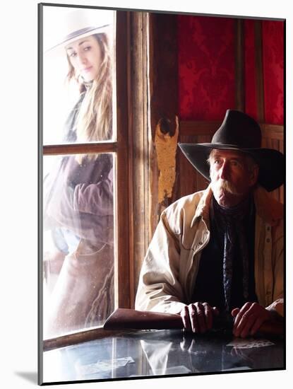 Cowboy with Rifle and Cowgirl Looking over His Shoulder-Terry Eggers-Mounted Photographic Print