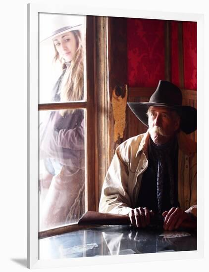 Cowboy with Rifle and Cowgirl Looking over His Shoulder-Terry Eggers-Framed Photographic Print