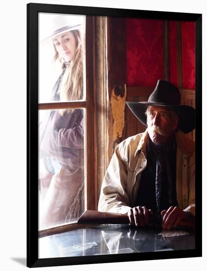 Cowboy with Rifle and Cowgirl Looking over His Shoulder-Terry Eggers-Framed Photographic Print