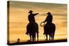 Cowboys and Horses in Silhouette at Dawn on Ranch, British Colombia, Canada-Peter Adams-Stretched Canvas