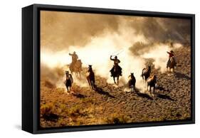 Cowboys Chasing Wilding Horses. Roping and Riding, with Dust Flying Everywhere-Jeanne Provost-Framed Stretched Canvas