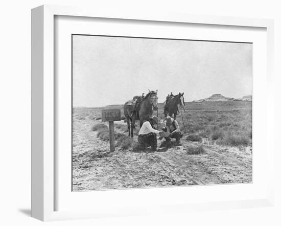 Cowboys Reading the News Near a Postbox Photograph - Texas-Lantern Press-Framed Art Print