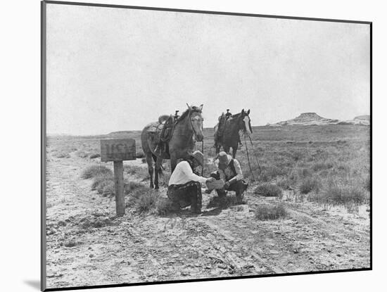 Cowboys Reading the News Near a Postbox Photograph - Texas-Lantern Press-Mounted Art Print