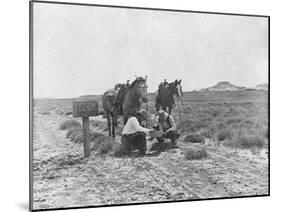 Cowboys Reading the News Near a Postbox Photograph - Texas-Lantern Press-Mounted Art Print