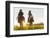 Cowboys Riding across Grassland with Moutains Behind, Early Morning, British Colombia, B.C., Canada-Peter Adams-Framed Photographic Print