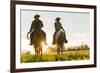 Cowboys Riding across Grassland with Moutains Behind, Early Morning, British Colombia, B.C., Canada-Peter Adams-Framed Photographic Print