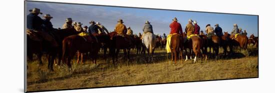 Cowboys Riding Horses in a Field-null-Mounted Photographic Print