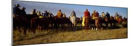 Cowboys Riding Horses in a Field-null-Mounted Photographic Print