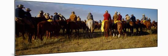 Cowboys Riding Horses in a Field-null-Mounted Photographic Print