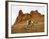 Cowgirl at Full Gallop with Red Rock Hills-Terry Eggers-Framed Photographic Print